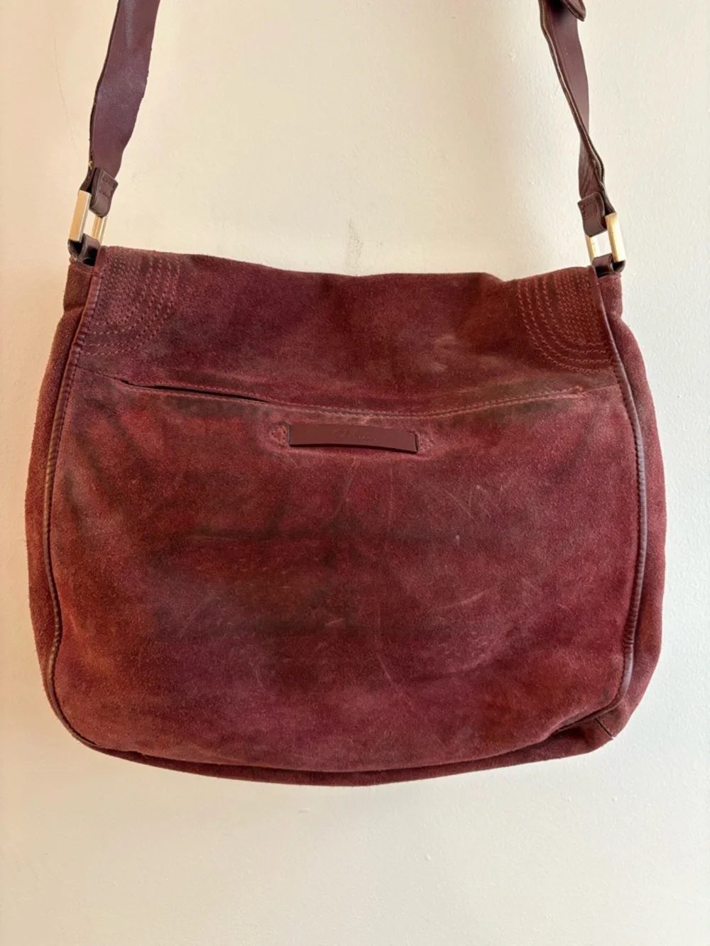 Cole Haan burgundy suede messenger bag with gold hardware